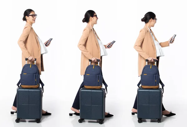 Full length 30s 40s Asian Pregnancy Woman business trip, walking forward left right, wear formal blazer pant shoes. Smile Office female carry backpack luggage phone over white background isolated