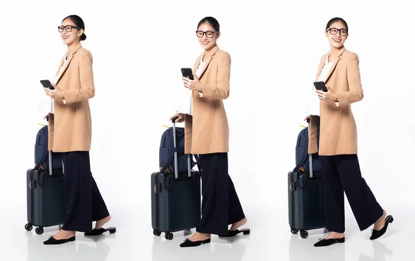 Full length 30s 40s Asian Pregnancy Woman business trip, walking forward left right, wear formal blazer pant shoes. Smile Office female carry backpack luggage phone over white background isolated