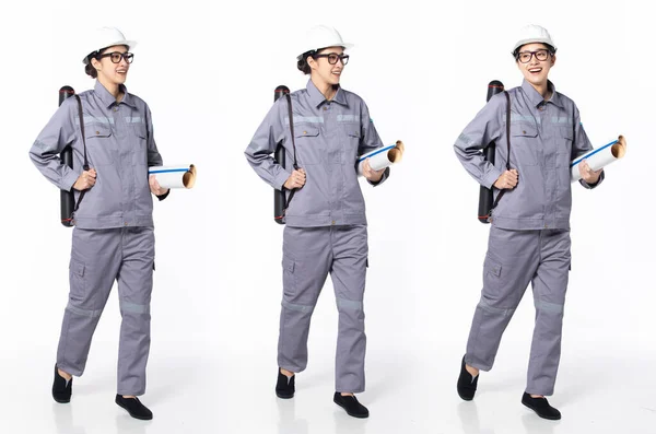 un ingeniero de la industria asiático profesional trabaja con un uniforme  de seguridad con herramientas de