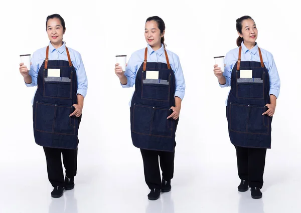 Full length 40s 50s Asian Senior Woman coffee barista waitress, walking forward left right, wear white formal uniform pants. Smile cafe female stands feels smile happy over white background isolated