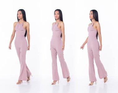 Full Length disable person without fingers thumb hand of young adult woman walk confident and happy, white background isolated. Asian female smile cheerful in casual attire professional business