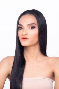 Beautiful fresh skin woman open shoulder with clean look make up and long black hair. Portrait young girl in attractive natural fashion face express feel smile, show eye lip, isolated white background