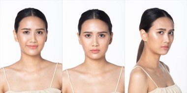 Yüz resmi, 20 'li yaşlarda güzel bir Asyalı kadının güzel gözleri, dudakları ve pürüzsüz bir teni var. Siyah uzun düz saçlı kadın mutlu bir gülümseme hissediyor. Moda modası modası beyaz arka planda izole edilmiş pozlar veriyor.