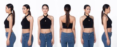 Yarı vücut 20 'li yaşlarda Asyalı bir kadın resmi kısa kot pantolon giyer. Siyah uzun düz saçlı kadın mutlu bir gülümseme hissediyor. Moda modası modası beyaz arka planda izole edilmiş pozlar veriyor.
