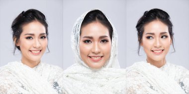 20 'li yaşlardaki Asyalı kadının güzel bir düğün cildi var. Dantelli başörtüsü kadın mutlu bir gülümseme hisset moda modası gri arka planda izole edilmiş fotokopi alanı üzerine pozlar