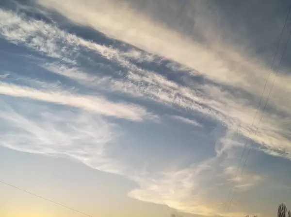 white clouds in the form of birds, angels in the blue sky. protection of Ukraine.