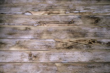 Beyaz boyayla boyanmış eski doğal ahşap tahtalar.