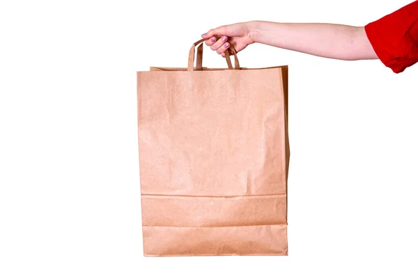 Woman Hand Holds Empty Kraft Paper Bag Isolated White Background — Zdjęcie stockowe