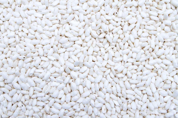 Pustade vitt ris, bakgrund — Stockfoto