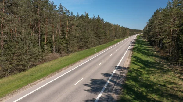 stock image Empty Rural Highway among Forest with No Cars on It