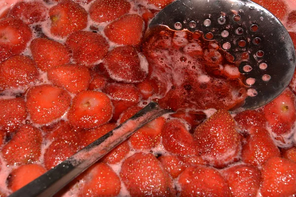 Strawberry jam cooking Royalty Free Stock Images