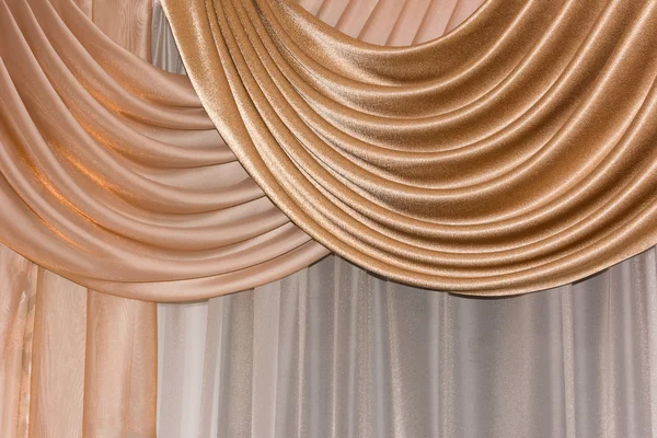 Open lambrequin (portiere, curtain) golden color Royalty Free Stock Photos