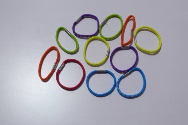 Multi Colors rubber bands on a white background