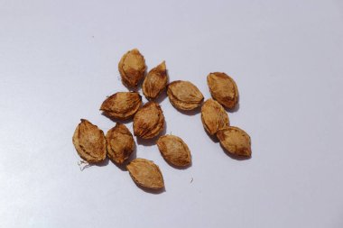  plums Seeds on an isolated white background