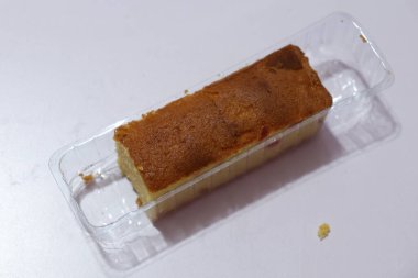 Plum cake cut pieces Isolated on white background 