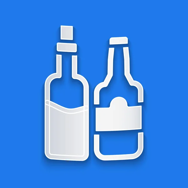 Papier découpé icône bouteille de whisky isolé sur fond bleu. Style art du papier. Vecteur — Image vectorielle