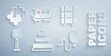 Piramit oyuncağı, oyuncak tren yolu, kürek, balon yolcu vagonu ve bulmaca parçaları ikonu. Vektör