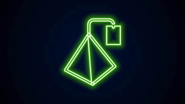Leuchtende Neon-Linie Teebeutel-Symbol isoliert auf schwarzem Hintergrund. 4K Video Motion Grafik Animation — Stockvideo