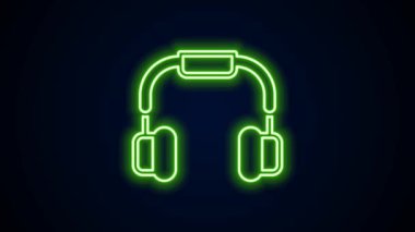 Parlayan neon hattı kulaklık simgesi siyah arkaplanda izole edildi. Kulaklıklar. Müzik, hizmet, iletişim ve operatör konsepti. 4K Video hareketli grafik canlandırması