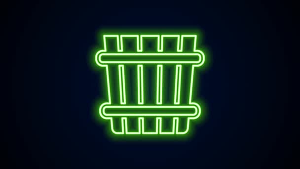 Glowing neon line Sauna bucket icon isolated on black background. 4K Video motion graphic animation — Stock Video