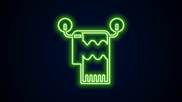 Glowing neon line Towel on hanger icon isolated on black background. Bathroom towel icon. 4K Video motion graphic animation — Stock Video