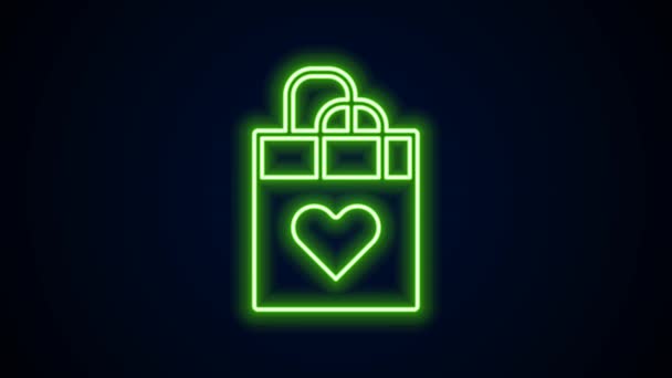 Λαμπερό νέον γραμμή Τσάντα αγορών με το εικονίδιο καρδιά απομονώνονται σε μαύρο φόντο. Ψώνια τσάντα κατάστημα αγάπη σαν εικονίδιο καρδιά. Ευτυχισμένη ημέρα του Αγίου Βαλεντίνου. 4K Γραφική κίνηση κίνησης βίντεο — Αρχείο Βίντεο