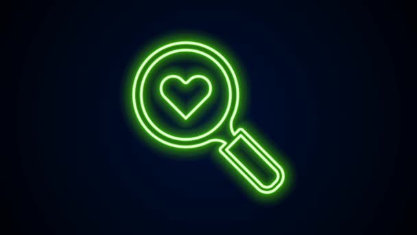 Parlayan neon hattı. Siyah arka planda izole edilmiş kalp ve aşk simgesini ara. İçinde kalp olan büyüteç. Sevgililer günün kutlu olsun. 4K Video hareketli grafik canlandırması — Stok video