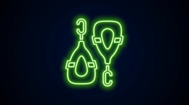 Parlayan neon çizgili küpe simgesi siyah arkaplanda izole edildi. Mücevher aksesuarları. 4K Video hareketli grafik canlandırması