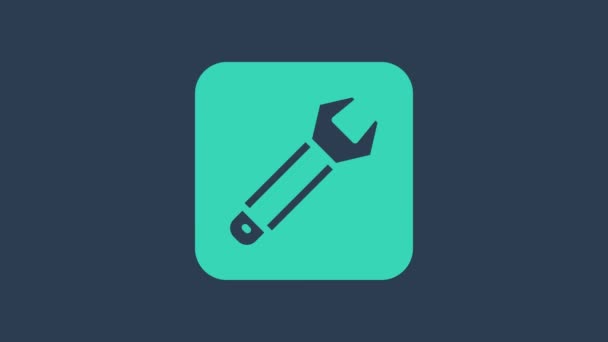 Turquoise Wrench spanner icon isolated on blue background. Spanner repair tool. Service tool symbol. 4K Video motion graphic animation — Wideo stockowe