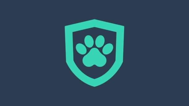 Turquoise Animal health insurance icon isolated on blue background. Pet protection concept. Dog or cat paw print. 4K Video motion graphic animation — стоковое видео