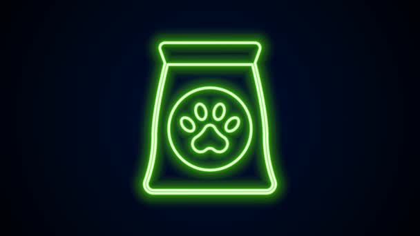 Glowing neon line Bag of food for pet icon isolated on black background. Food for animals. Dog bone sign. Pet food package. 4K Video motion graphic animation — Stock Video