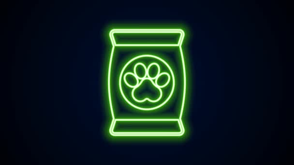 Glowing neon line Bag of food for pet icon isolated on black background. Food for animals. Dog bone sign. Pet food package. 4K Video motion graphic animation — Stock Video