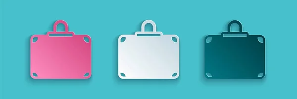 Papier gesneden Koffer voor reizen pictogram geïsoleerd op blauwe achtergrond. Reisbagagebord. Reisbagage icoon. Papierkunst stijl. Vector — Stockvector