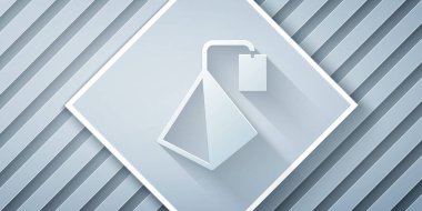 Kağıt kesiği, gri arkaplanda izole edilmiş çay poşeti simgesi. Kağıt sanatı tarzı. Vektör