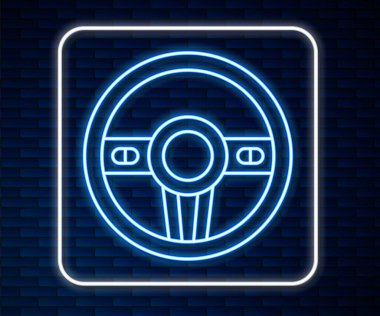 Parlayan neon çizgisi direksiyon simgesi tuğla duvar arkasında izole edilmiş. Araba tekeri ikonu. Vektör.