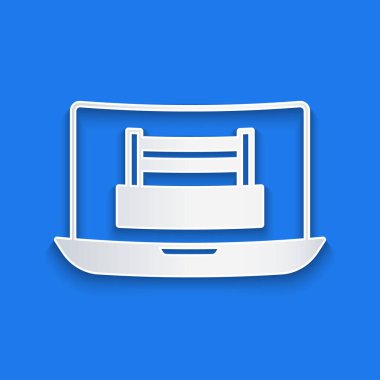 Kağıt kesiği, mavi arka planda dizüstü bilgisayar simgesinde boks ringi gösterisi. Kağıt sanatı tarzı. Vektör