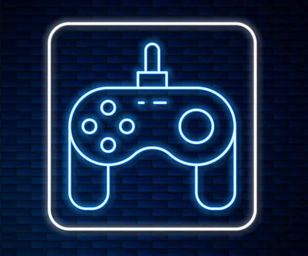 Parlayan neon hattı Gamepad simgesi tuğla duvar arka planında izole edildi. Oyun kontrolörü. Vektör.