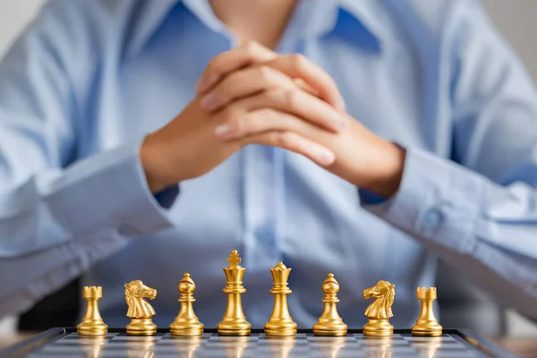 Human Clasped Hands Planning Strategy Gold Chess Chessboard Success Management — стоковое фото