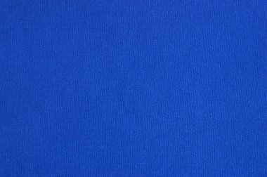 Doğal mavi kumaşın yakın çekim dokusu ya da açık mavi kumaş. Doğal pamuk veya keten kumaş dokusu. Mavi tuval arkaplanı.