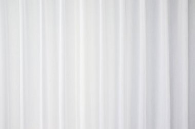 Beyaz dalgalı perde dokusu ve arka plan. Soyut arkaplanlar.