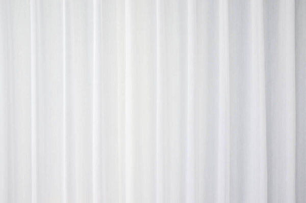 White wavy curtain texture and background. Abstract backgrounds.