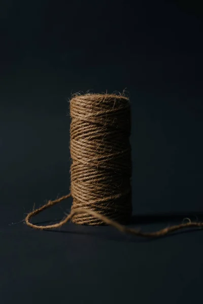Natural flax rope twine on black background — Stock Photo, Image