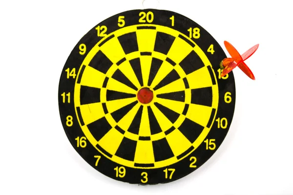 Red dart hitting out of the target — Stock Photo, Image