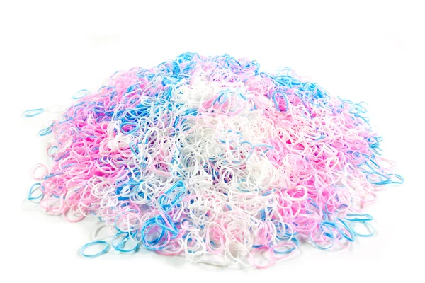 Kleines weißes, blaues und rosafarbenes Plastikband — Stockfoto