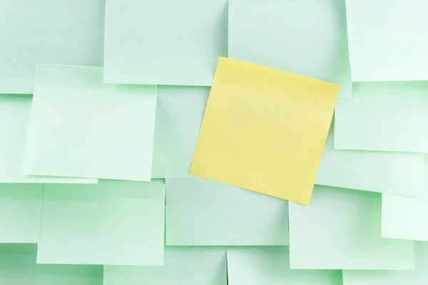 Green and yellow post-it note — Stock Photo, Image