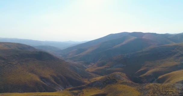 Panoramic view over mountain Judea and Samaria desert In South Israel. Top hill rock mountains blue sky and clouds landscape of the horizon with shadow terrain curves Judean Wilderness — Stock Video