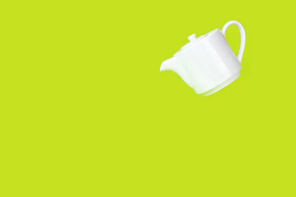 White Ceramic Kettle Teapot Woman Hand Green Background Tea Concept — Stock Photo, Image