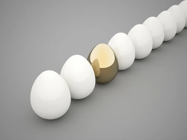Eggs white one gold — Stock Photo, Image