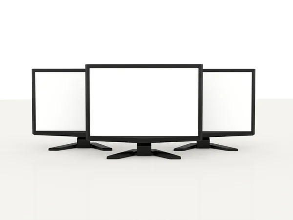 Three LCD monitors with white screen — Stock Photo, Image