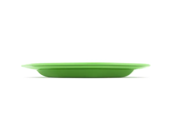 Green plate isolated on white — Stock Photo, Image